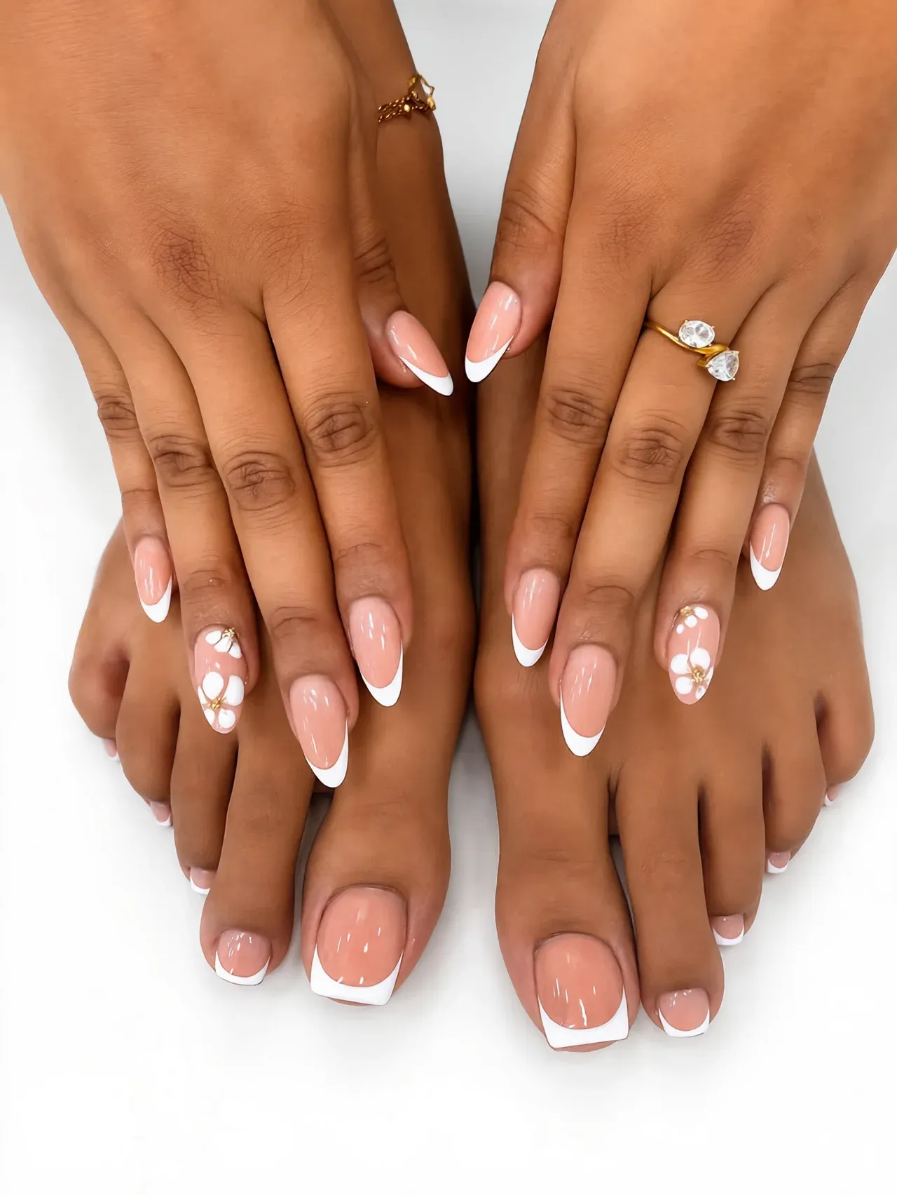 Matching white French manicure and pedicure