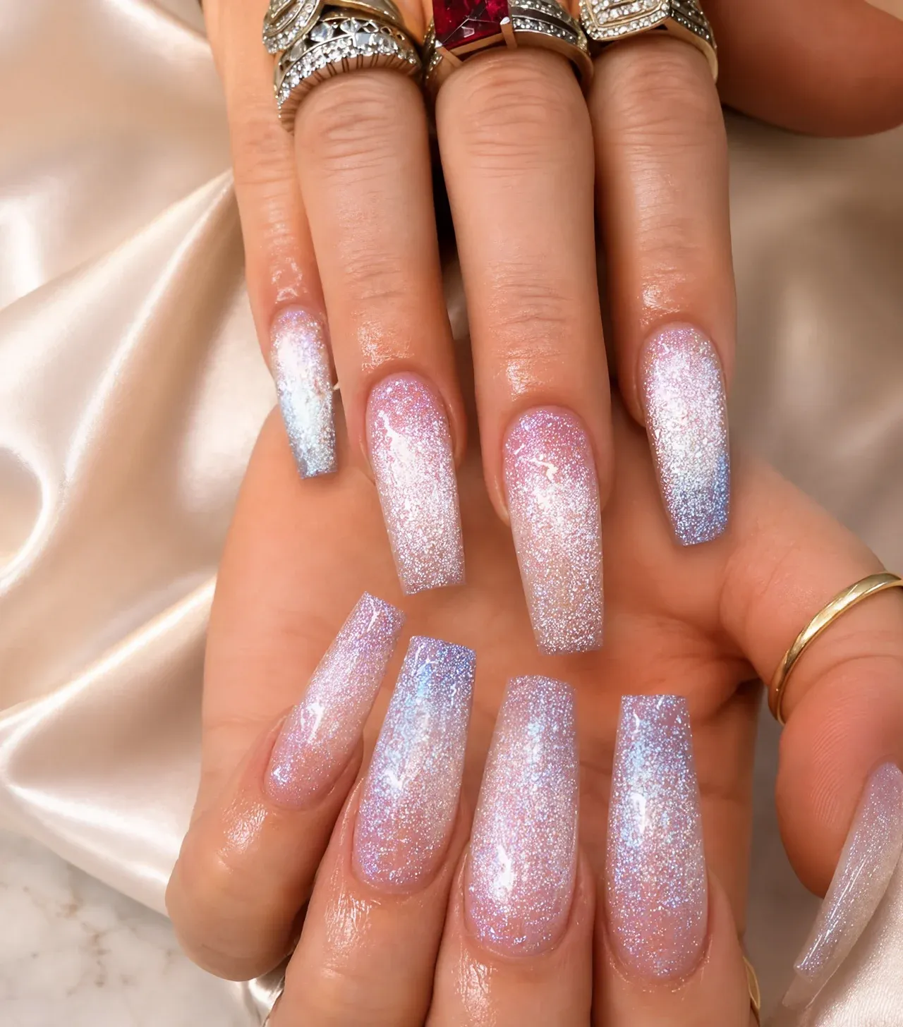 Iridescent pink and silver glitter coffin nails