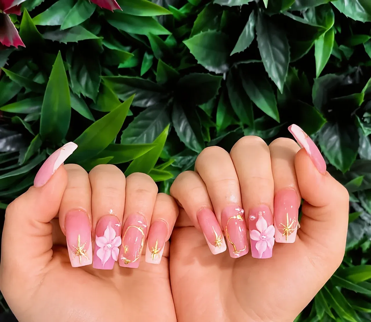 Pink ombre coffin nails with hand-sculpted 3D flowers and gold accents